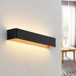 Arcchio LED-væglampe Karam, 53 cm, sort, metal, op/ned