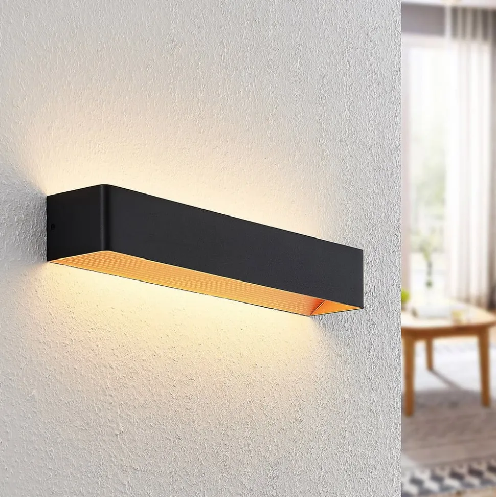 Arcchio LED-væglampe Karam, 53 cm, sort, metal, op/ned