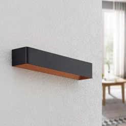 Arcchio LED-væglampe Karam, 53 cm, sort, metal, op/ned