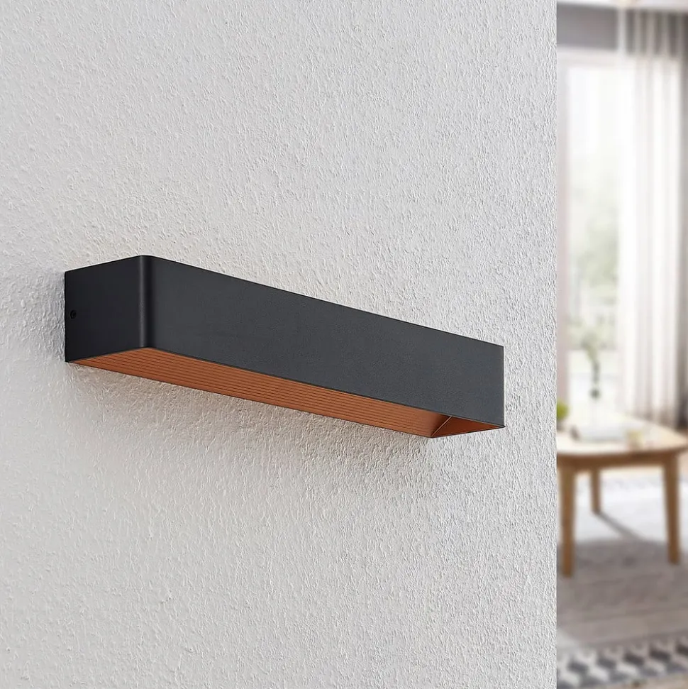 Arcchio LED-væglampe Karam, 53 cm, sort, metal, op/ned