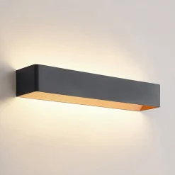 Arcchio LED-væglampe Karam, 53 cm, sort, metal, op/ned