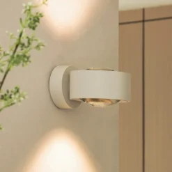 Arcchio LED-væglampe Rotari, linse, op/ned, hvid, metal