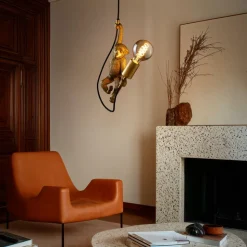 Extravaganza Chimp pendel, guld mat/sort