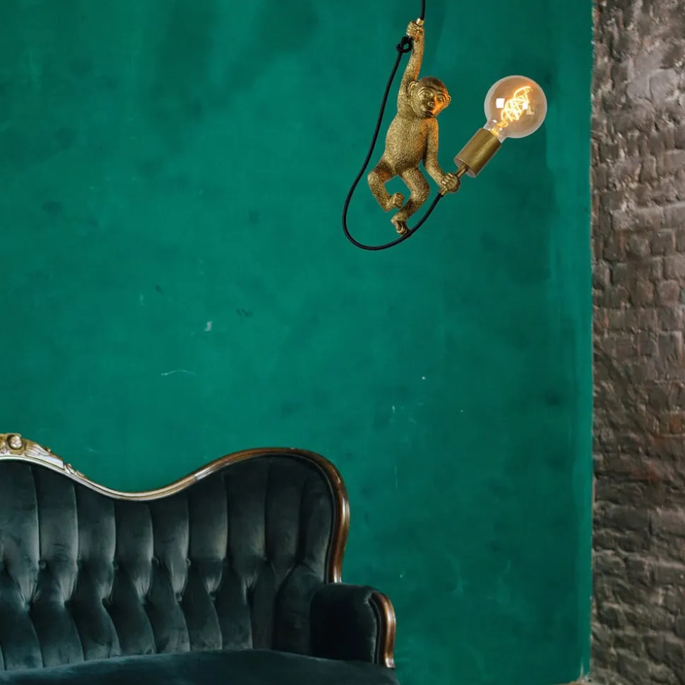 Extravaganza Chimp pendel, guld mat/sort