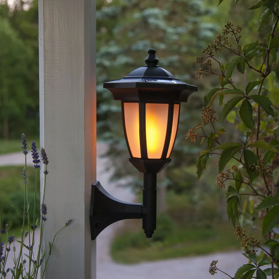 LED-solcellelampe Flame, 4-i-1, sort