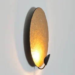 LED-væglampe Traversa, skinnende guld, Ø 35 cm