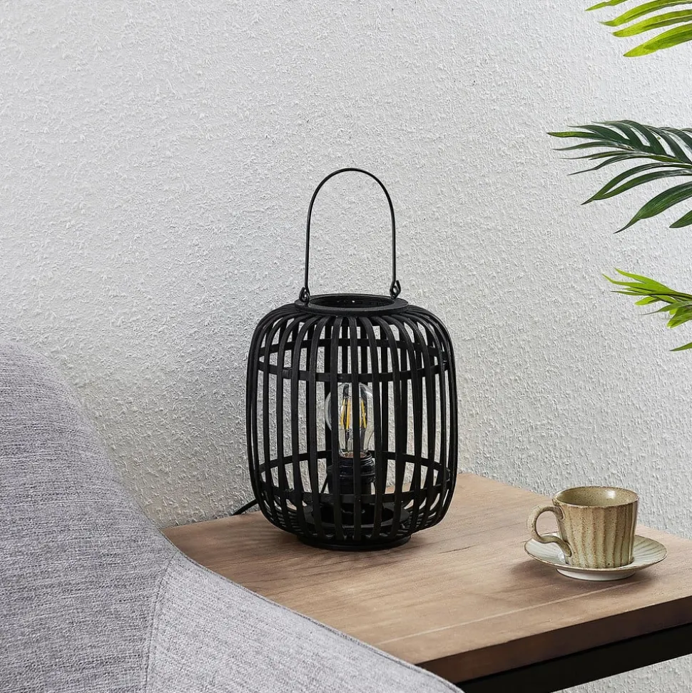 Lindby Canyana bordlampe, sort, rattan, 27 cm høj