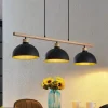 Lindby hængelampe Tirzana, 3 lyskilder, sort, metal, træ