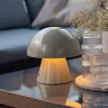 Lindby LED genopladelig bordlampe Nevijo, grå, Ø18cm, USB, dæmper