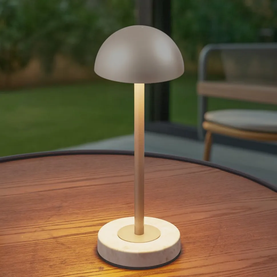 Lindby LED-batteridrevet bordlampe Pippin, guld/travertin, IP44