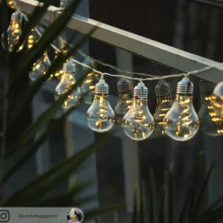 Lindby LED-lyskæde Lampini, 200 cm, sort, IP44