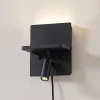 Lindby LED-væglampe Auden, sort, stik, ladestation