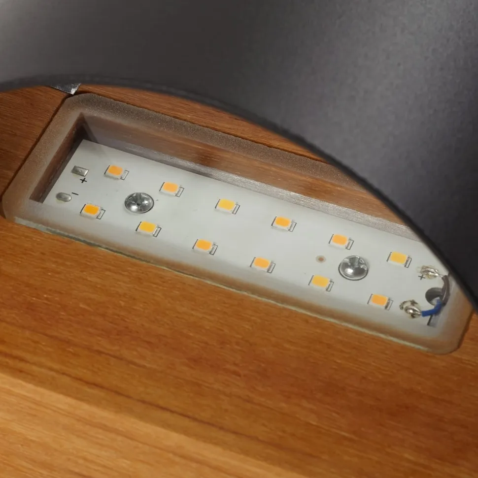 Lindby LED-væglampe Lenore, sort, metal, 13 cm, IP44