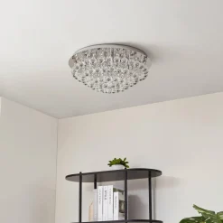 Lindby loftlampe Antonino, 8 lyskilder, krom, krystal, 55 cm