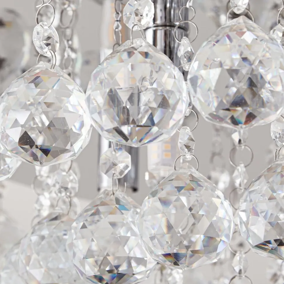 Lindby loftlampe Antonino, 8 lyskilder, krom, krystal, 55 cm