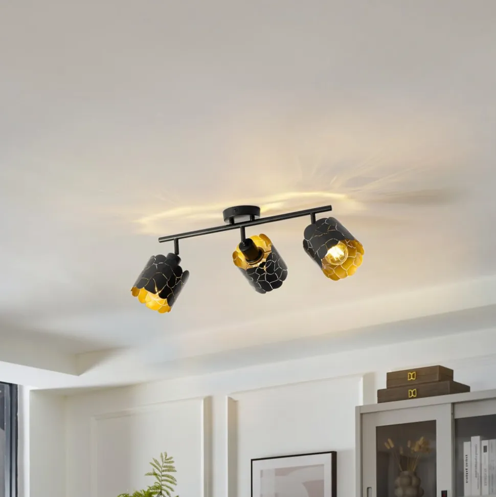 Lindby loftlampe Aralena, sort/guld, 3 lyskilder, længde 70 cm