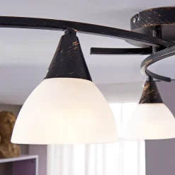 Lindby loftlampe Della, sort-guld, Ø 58 cm, 3 lyskilder, E14