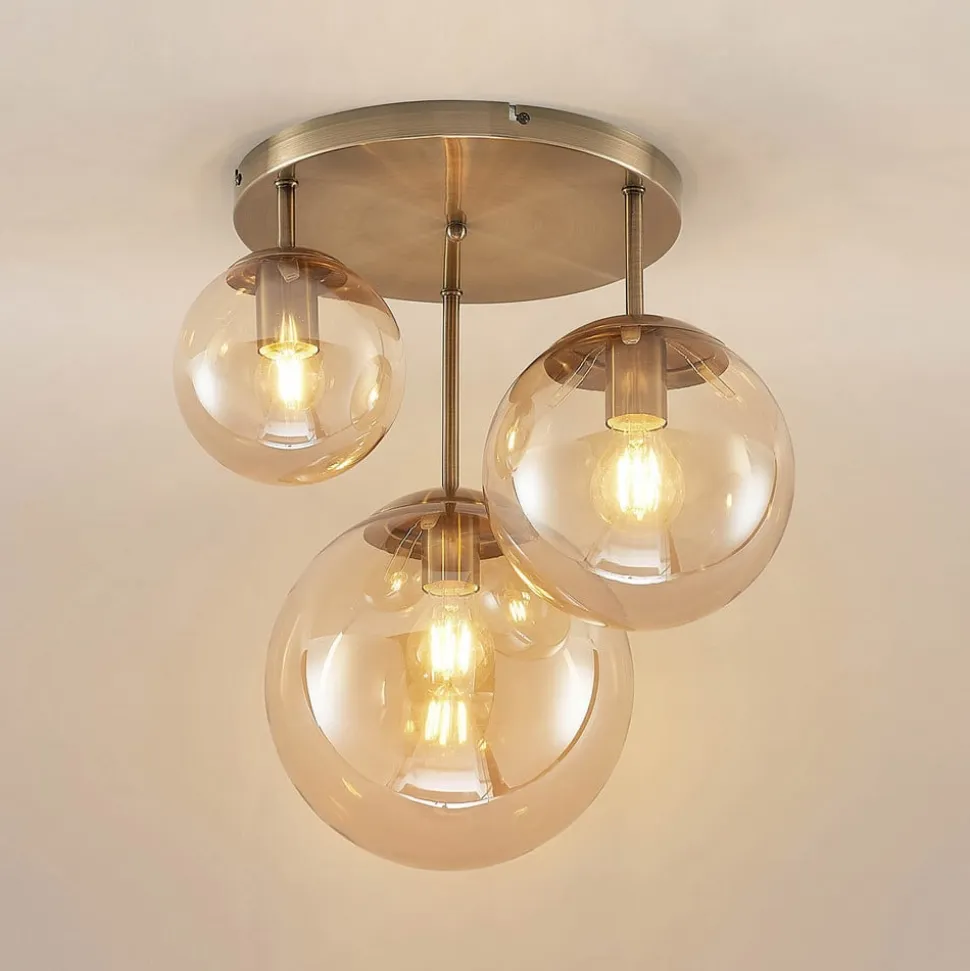 Lindby loftlampe Teeja, amber, 3 lyskilder, Ø47cm, glas, E27