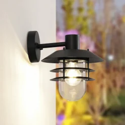 Lindby Meliora udendørs væglampe, sort, jern, IP44, E27
