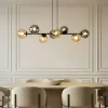Lindby pendellampe Isamer, smoke grey/amber, 130 cm, globe