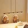 Lindby pendellampe Kaylou, 5 lyskilder, bronzefarvet, aluminium