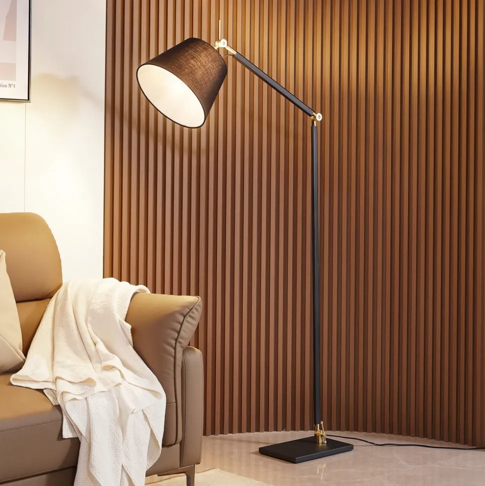 Lucande gulvlampe Marvaine, sort/guldfarvet, justerbar