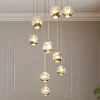 Lucande LED-hængelampe Hayley, Ø 40 cm, 9 lyskilder, guld, glas