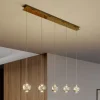 Lucande LED-pendellampe Hayley, 96 cm, 5 lyskilder, guld, glas
