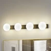 Lucande LED-væglampe til badeværelset Myrra, sort, glas, 60 cm, IP44