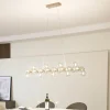 Lucande-pendel Naelen, guld/amber, 125 cm, glas, G9