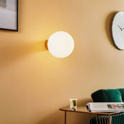 Væglampe Dione, vægbeslag guld